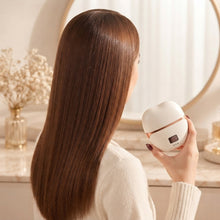 Capelli lisci e lucidi con la spazzola lisciante mini